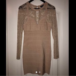 Nude lace sleeve dress.